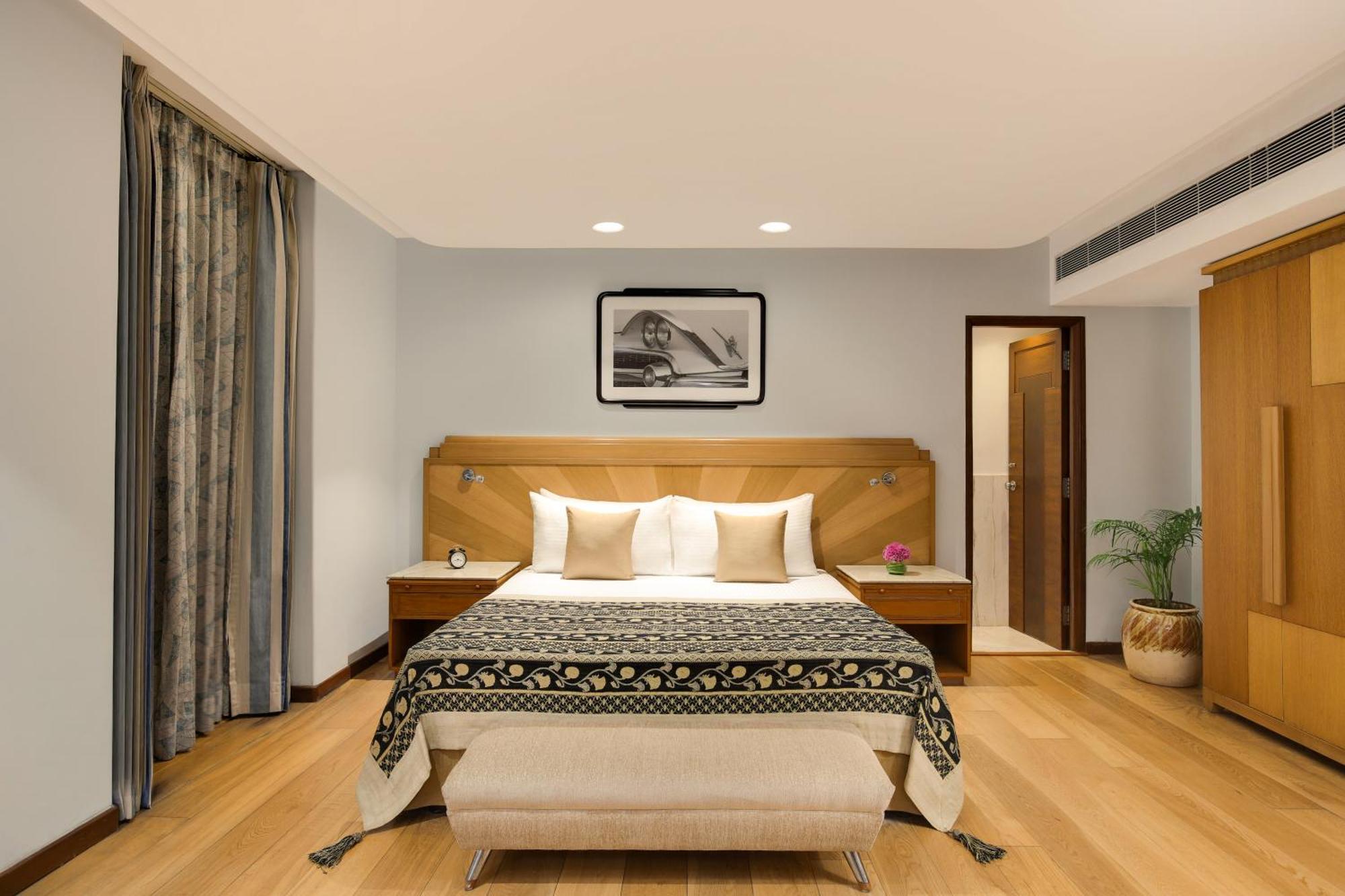 Отель Ambassador, New Delhi - Ihcl Seleqtions Экстерьер фото A bedroom at the Taj Bengal
